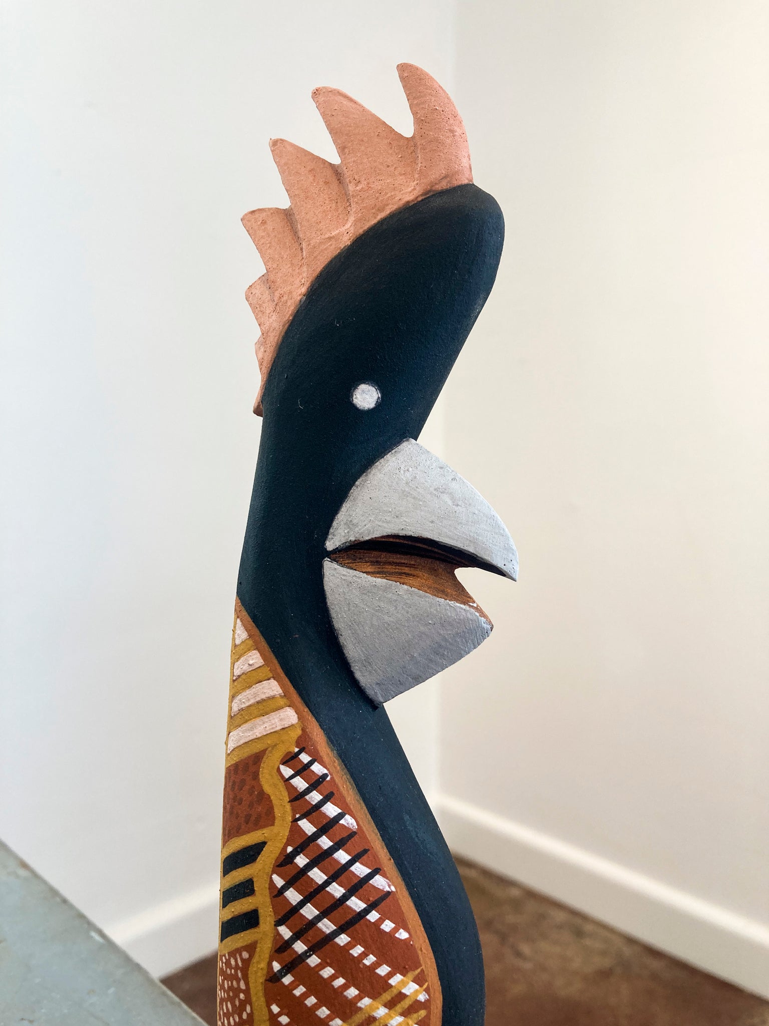 Hand-painted bird carving