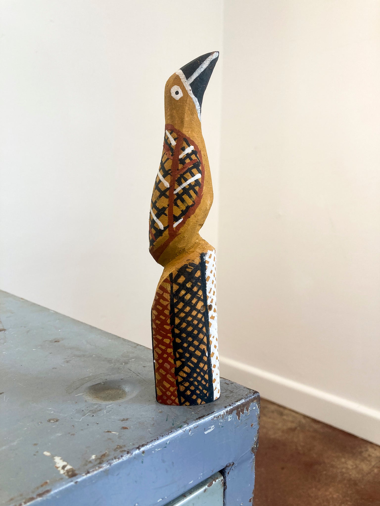 Hand-painted bird carving