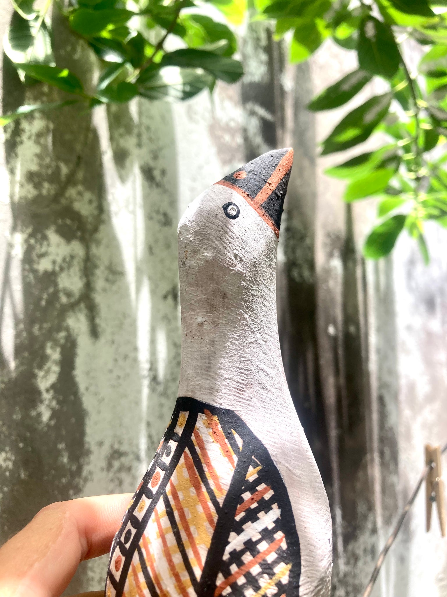 Hand-painted bird carving